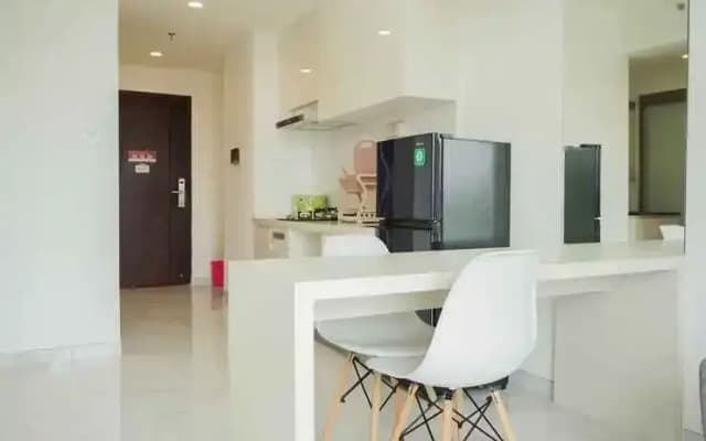 Cozy Design Fully Furnished 2BR at Sky House BSD Apartment By Travelio