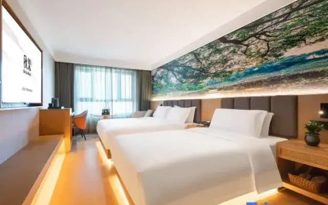 Jizhou Qiuguo Hotel (Harbin West Railway Station & Heilongjiang University Metro Station Branch)