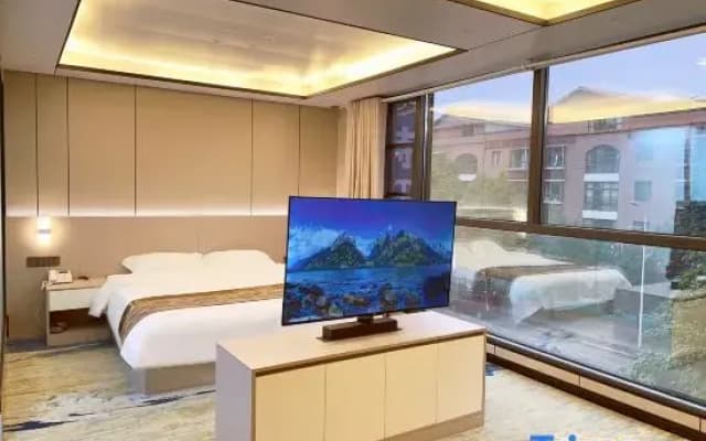 Puding Shiyu Business Hotel (Xingbo International)