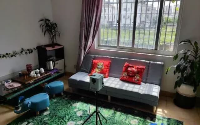 Zhangpu Warm Cottage Cinema-Style Homestay