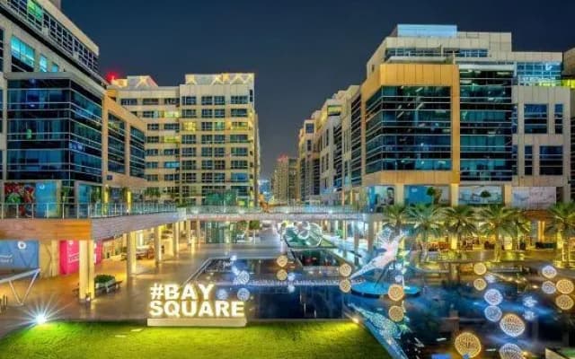 1BR + Extra Room w/ Terrace | Bay Square