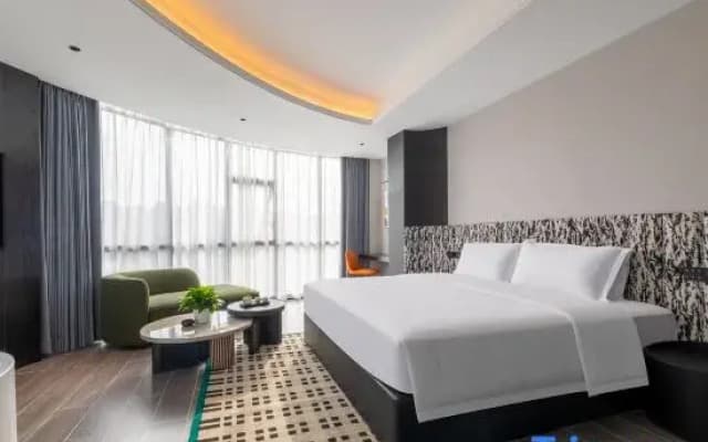 Qiwuli Hotel (Foshanxi Railway Station Shadi Airport)