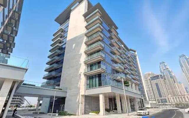 2BR + M | Canal Front Residence