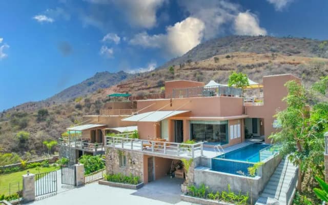 SaffronStays Moringa WishingTree - 3-BR villa near Nathdwara with pool, lawn and hillside views