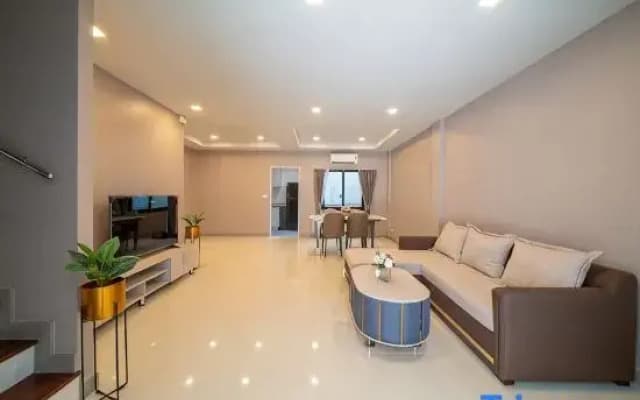 Master bedroom with a bathroom in a Pattaya villa.