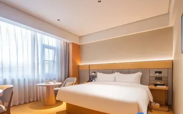 Ximan Hotel (Shanzhou District Government Wucaicheng Shopping Center)