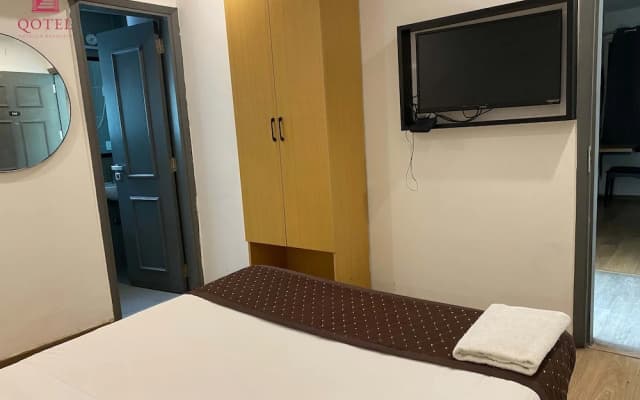 Qotel Hotel IP Residency