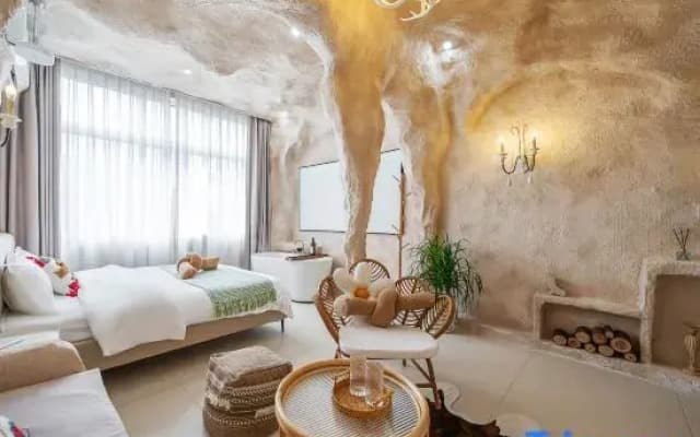 Qianxun Designer Homestay (Dengzhou Guangyi Sleepless City Branch)