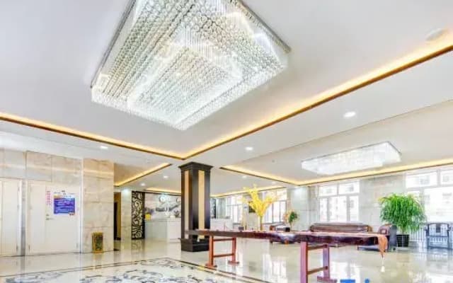 Huaxin Hotel (Junshang Outlets)