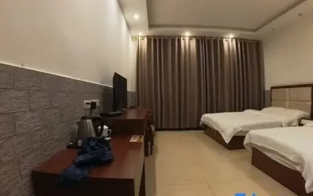 Pingle Xingfu Hotel