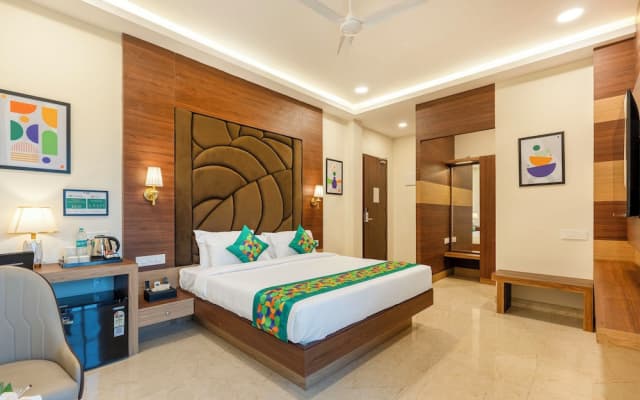 Treebo Premium Pine Tree Courtyard