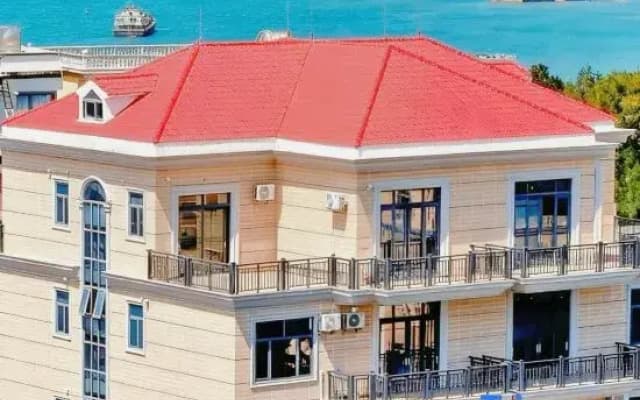 Meizhou Island HeMu (Mazu Ancestral Temple Branch) – 180° Ocean-View Homestay with Front-Row