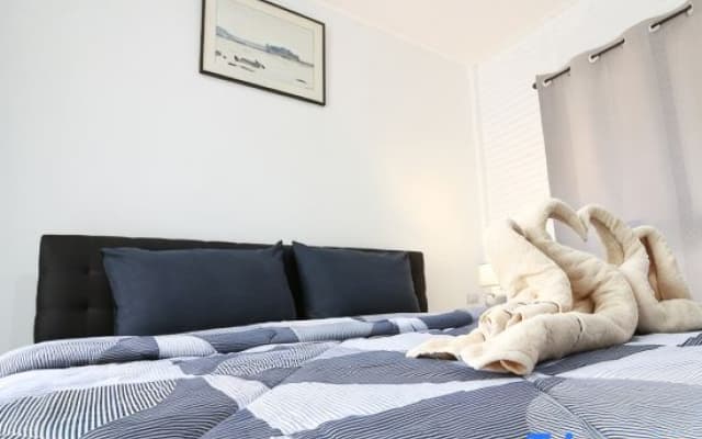 Charming White Wooden Home Stay