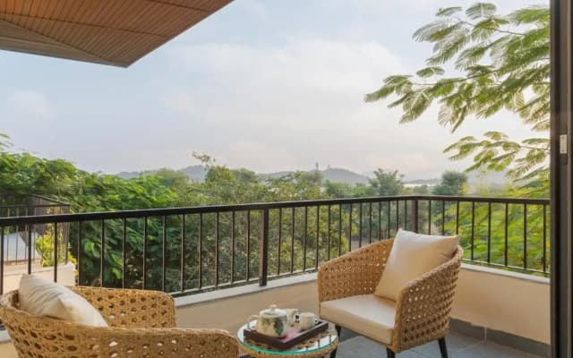 SaffronStays Camelot by the Lake - 3BR villa with glass walls, TT, projector, and gardens, Udaipur