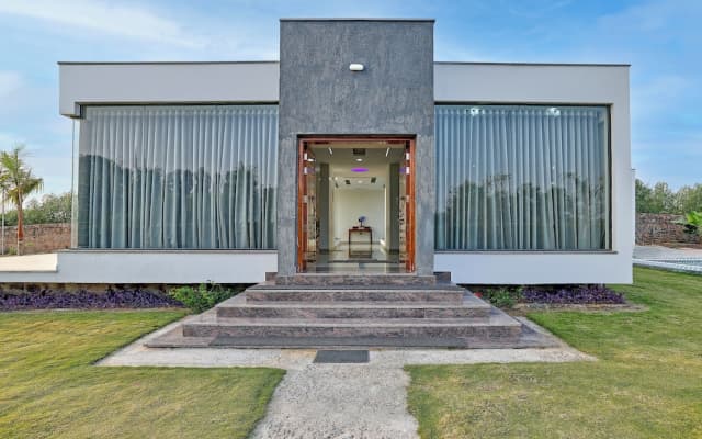 ELIVAAS Amaltas 4BHK Hideaway With Pool