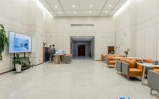 Longkou Jinli Serviced Apartment Hotel (Longhu Tianjie Poly Plaza)