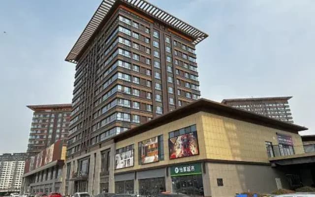 Yunxuan Hotel (East Aru Shangcheng Plaza Bus Station)