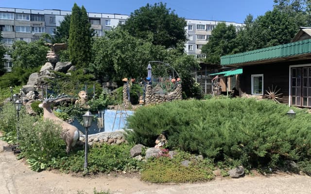 Частный дом Домик в саду