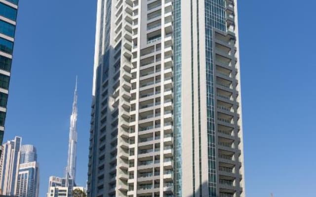 Отель Aura Suites Downtown
