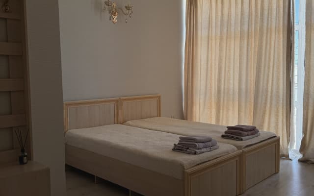 Меблированные комнаты Уютные номера, пешком до набережной