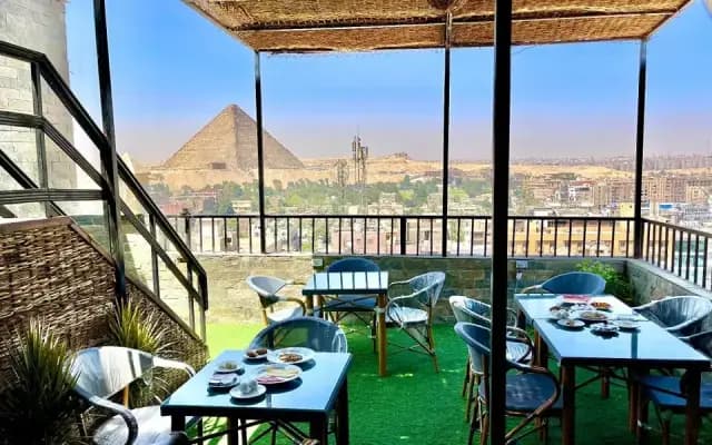 Отель Pyramids Tour View Inn