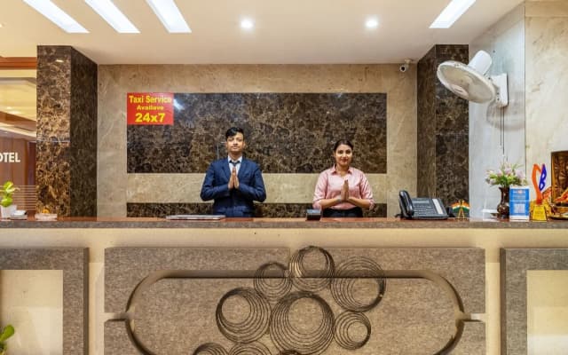 Отель Corporate Suites