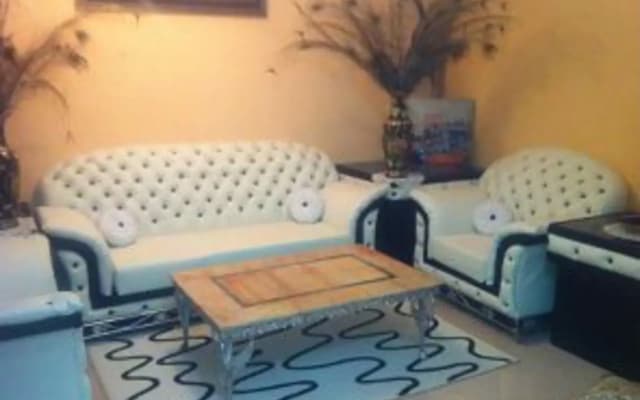 Naima House