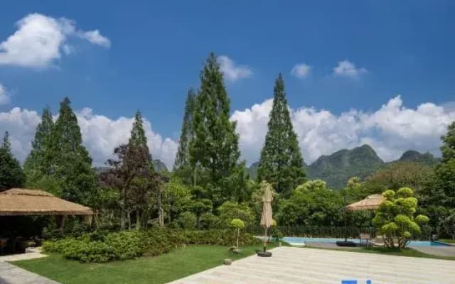 Xinchang Huaqianyueshang Homestay (Nineteen Peaks)