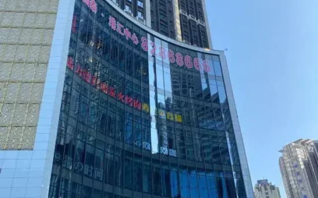 Ganghui Four Seasons Hotel Apartment (Dalian Railway Station Zhongshan Square)