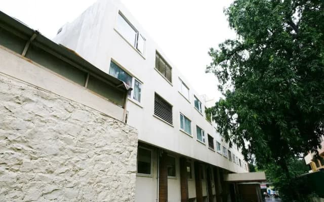 Capital O 45587 The Roa Hotel