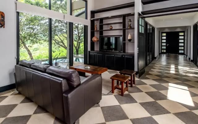 Nostalgic Retro Home on Luxurious Lot with a Private Infinity Pool and Ocean Views