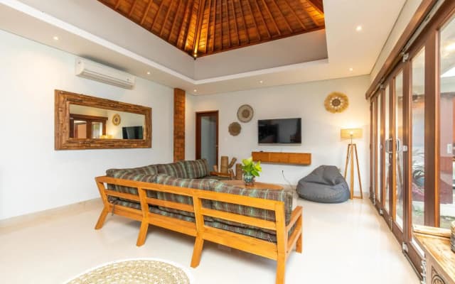 BRAND NEW Villa Kamboja Premium walk to Beach - enclosed living room with AC