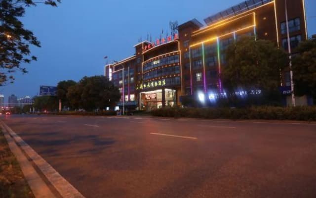 New Era Business Hotel (Anqing Wuyue Plaza Branch)
