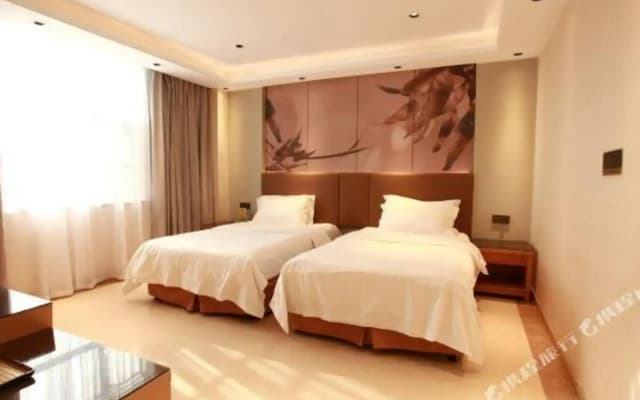 Home Inn Alliance Huayi Hotel (Tancheng Railway Station Tanguo Ancient City)