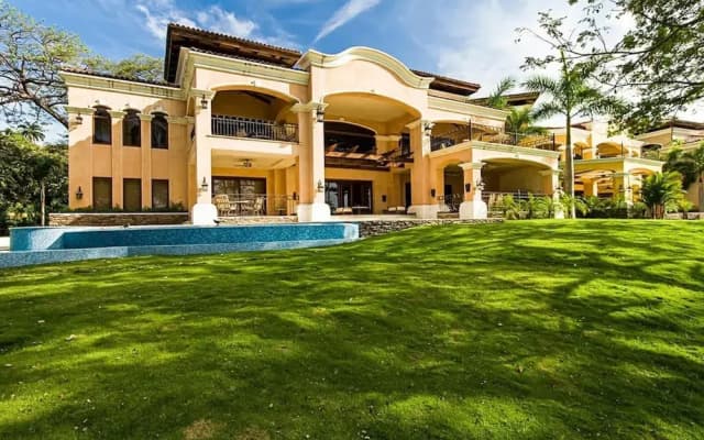 Luxurious Beachfront Mansion with a Stunning Infinity Pool in Playa Flamingo