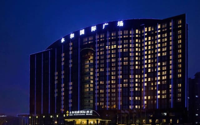 Noble International Hotel