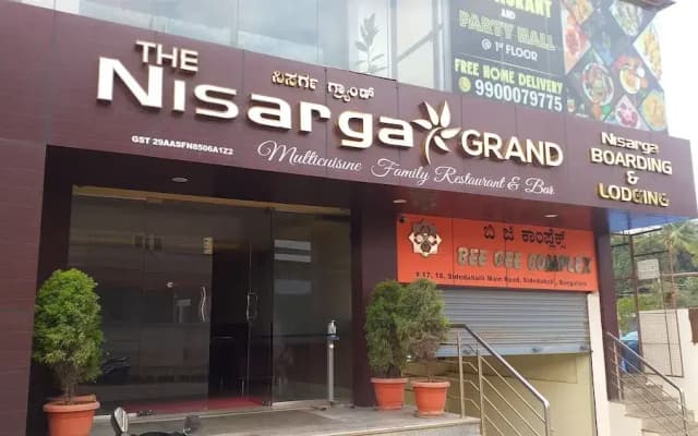 the Nisarga Grand   boarding & lodging
