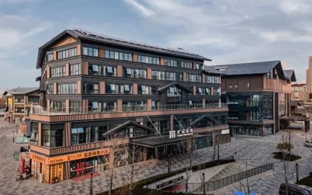 Maison New Century Hotel Lu'an