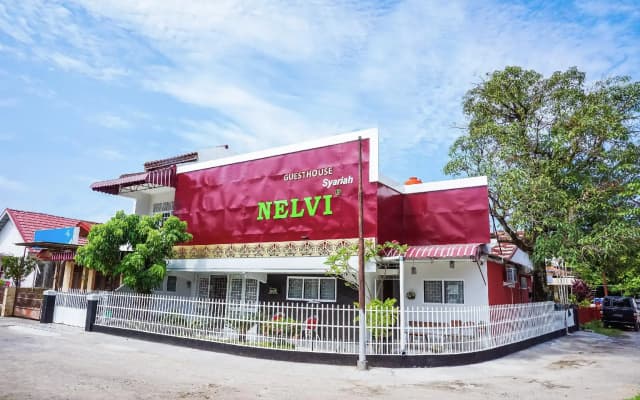 Hotel O Jalan Jenderal Sudirman Near Imam Bonjol Square Formerly Nelvi Guest House
