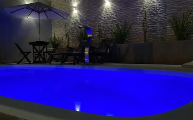 Casa com piscina e um quarto com ar split pé na areia a 50 metros da praia