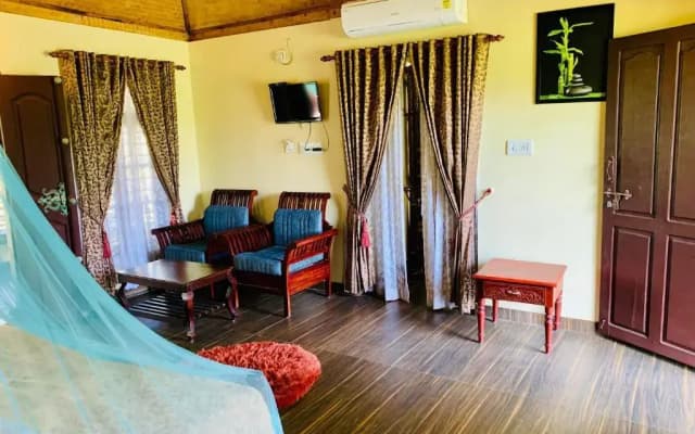 Maadathil Cottages