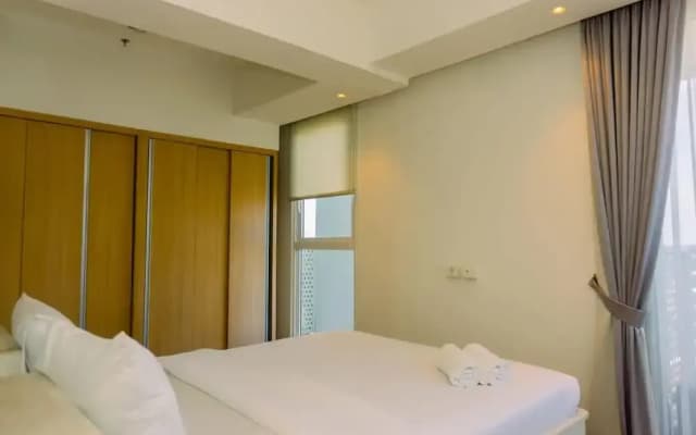 Spacious 1BR with Japandi Design at West Vista Apartment By Travelio
