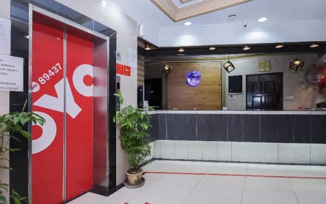 Cosy Inn by OYO Rooms