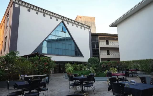 Hotel Trupti International by Iroomz