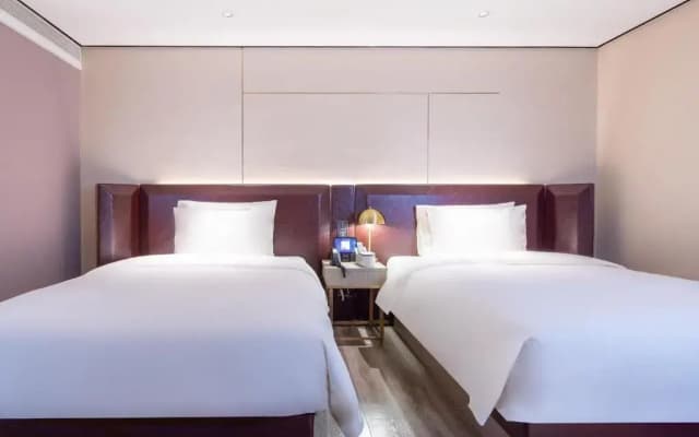 PLUS Yishang Hotel (Wanlvyuan Store of Haikou International Trade)