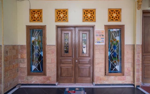RedDoorz Syariah near Predator Fun Park Batu 2