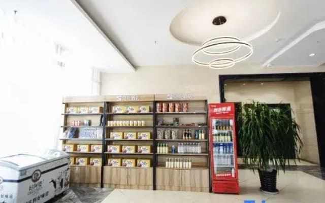 Shell Hotel (Fei County Dongfang Shopping Plaza Ginkgo Jin Street)