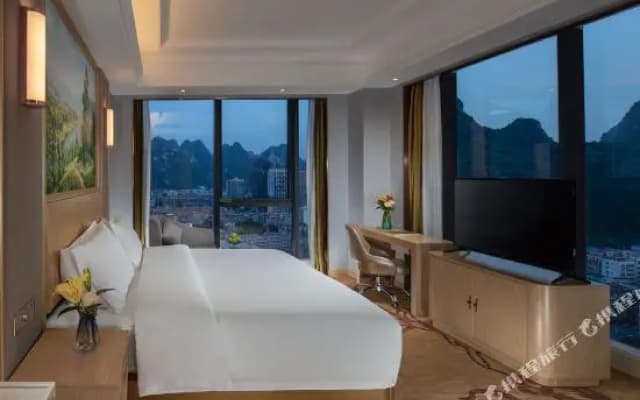 Vienna International Hotel (Hechi Tonggu)