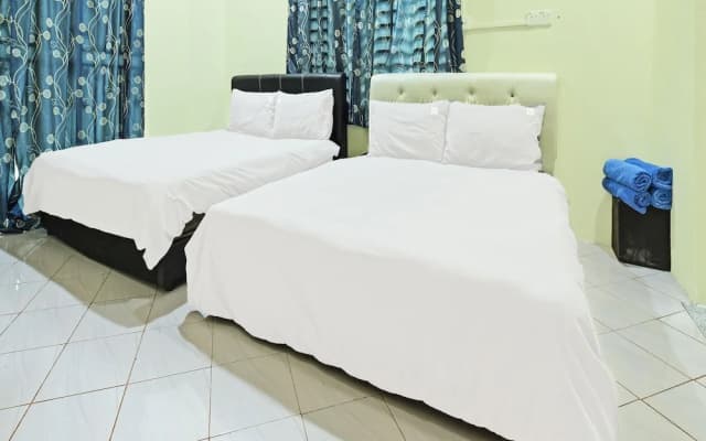 Oyo 90596 Casaria Inn