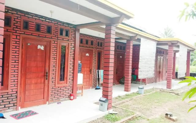 OYO 3303 Penginapan Putri Asih Sawarna